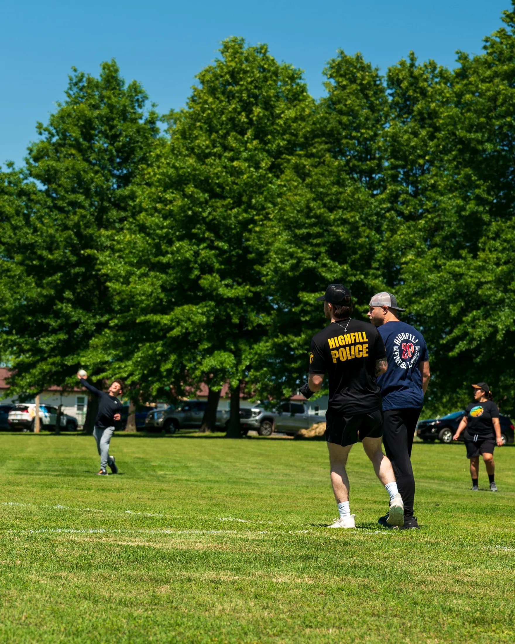 Highfill Police Department members on the field at the Chicago Ball Spring Festival