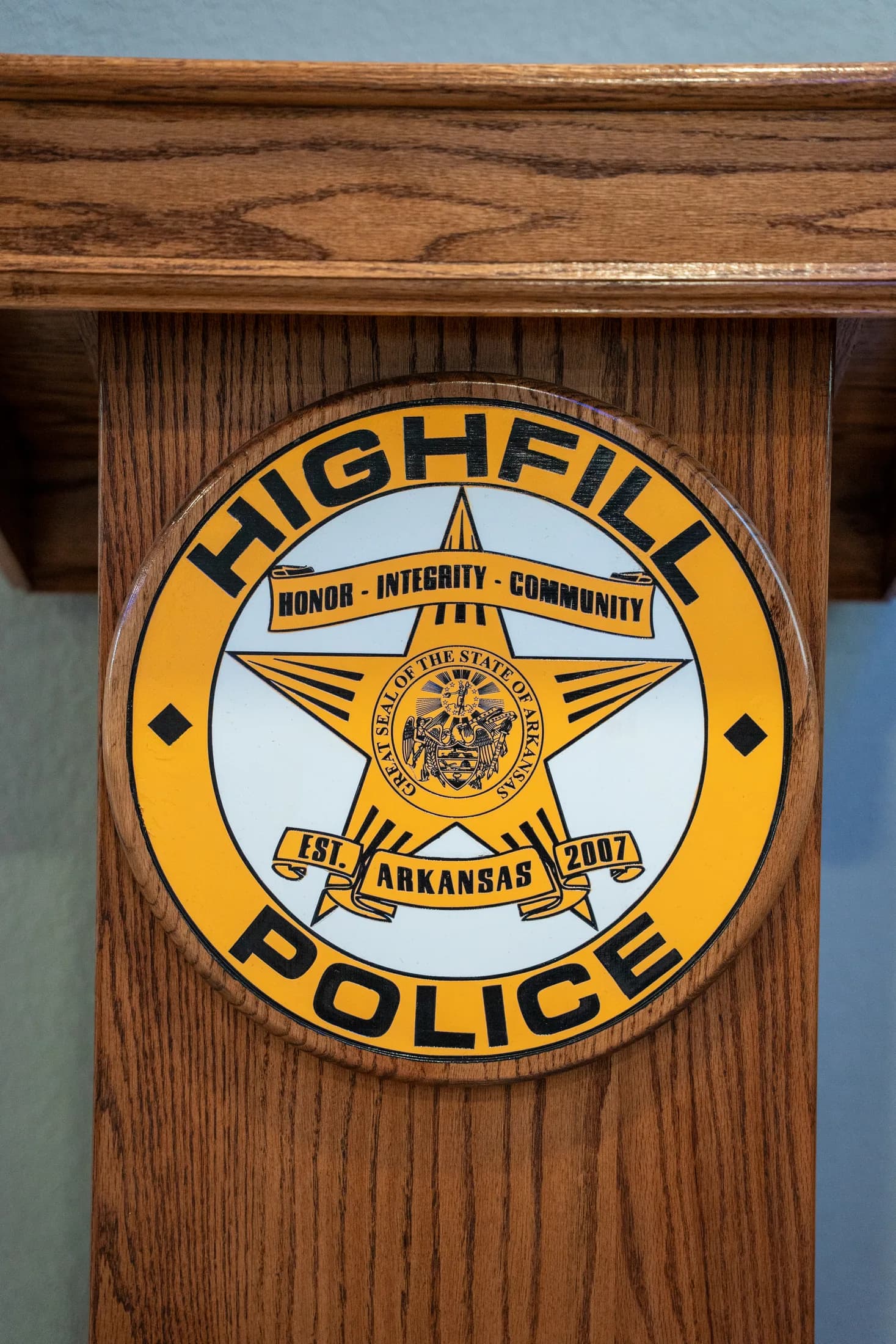 Highfill Police Department badge on department podium